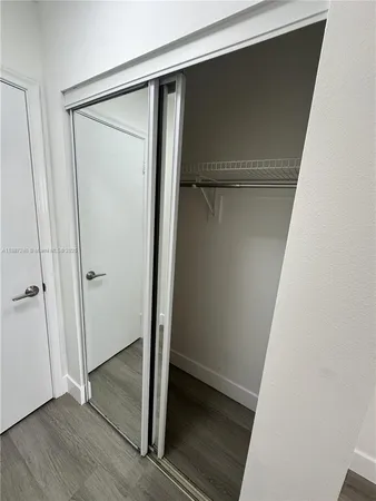 a view of an empty walk in closet