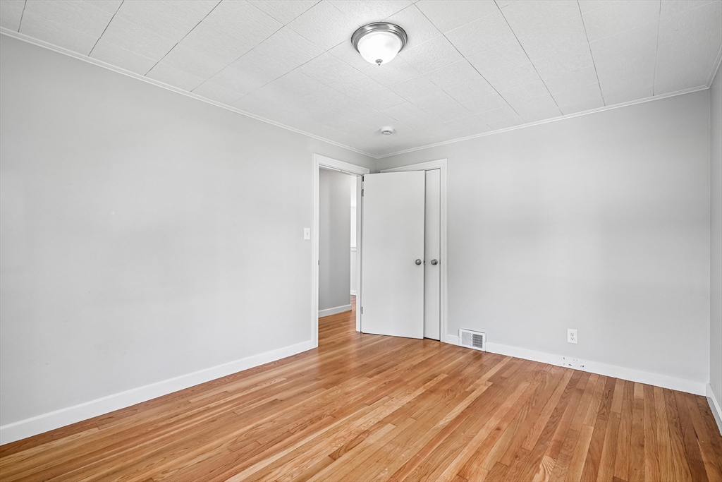 42 East Main Street Gloucester, MA 01930 - Photo 21 of 25 a view of empty room with wooden floor