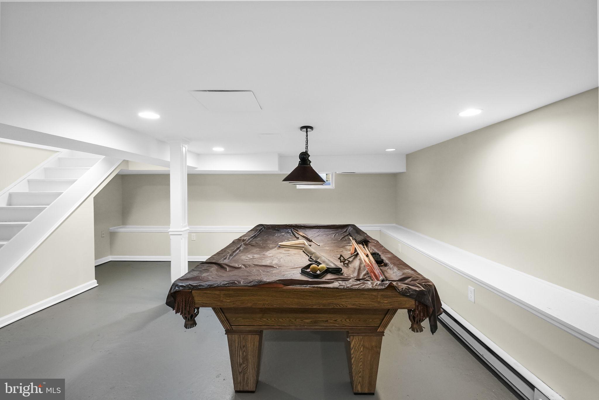 2046 Pennington Road Ewing, NJ 08618 - Photo 18 of 37 a living room with furniture and a ceiling fan