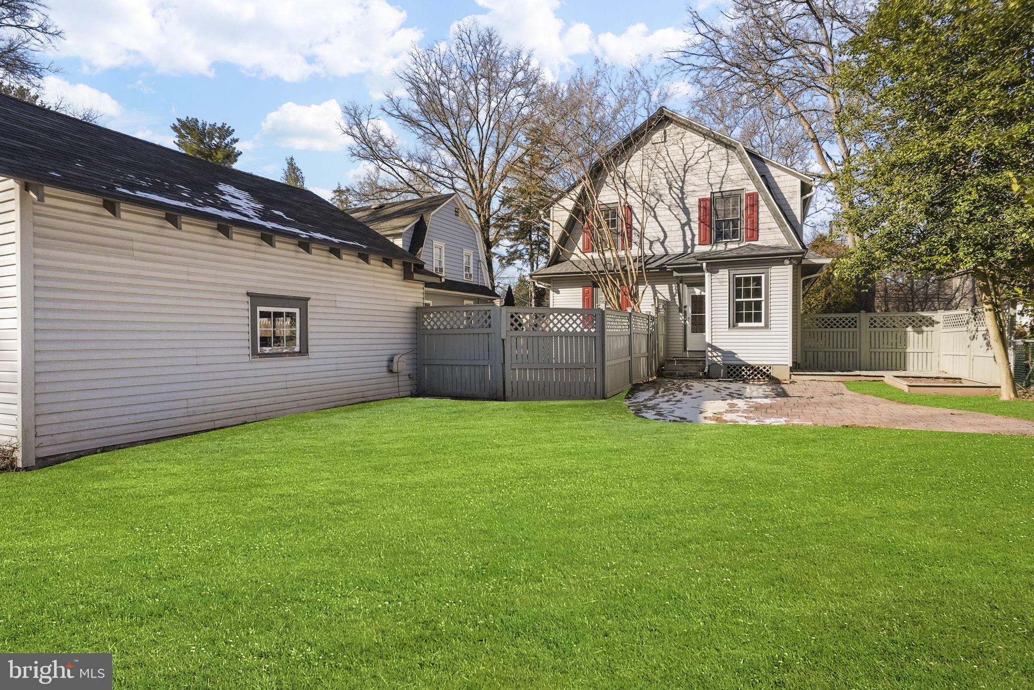 2046 Pennington Road Ewing, NJ 08618 - Photo 36 of 37 a backyard of a house with table and chairs