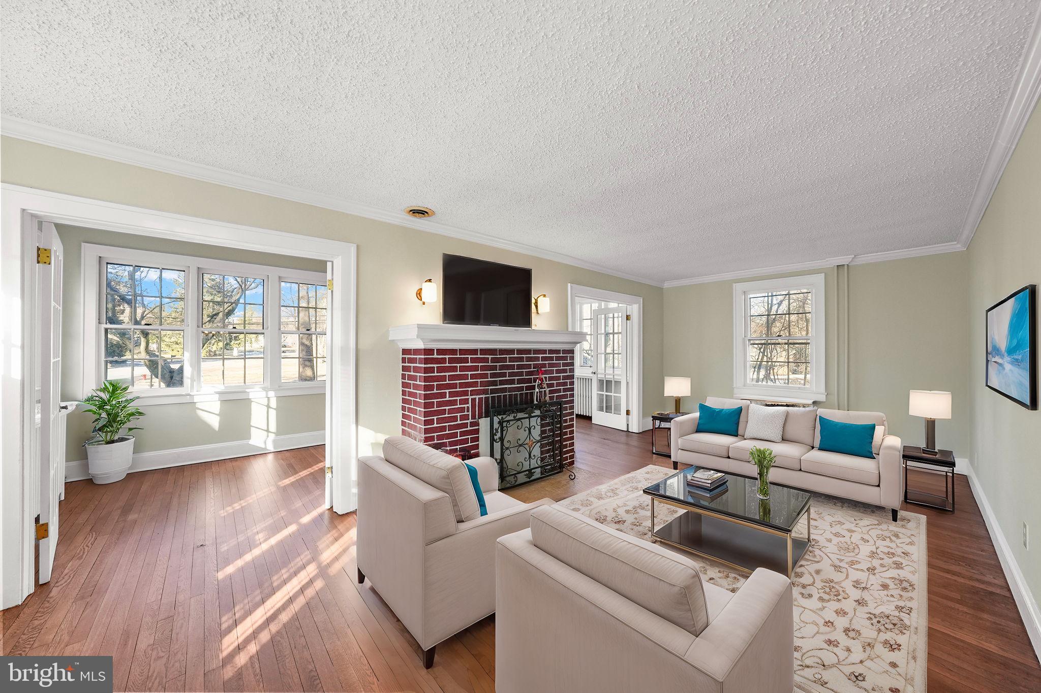 2046 Pennington Road Ewing, NJ 08618 - Photo 8 of 37 a living room with furniture large window and wooden floor