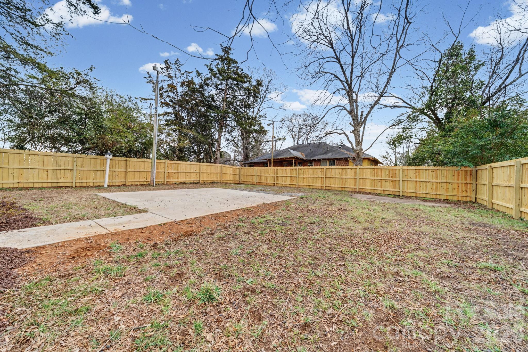 1132 East Main Street Albemarle, NC 28001 - Photo 25 of 25 a view of yard with wooden fence