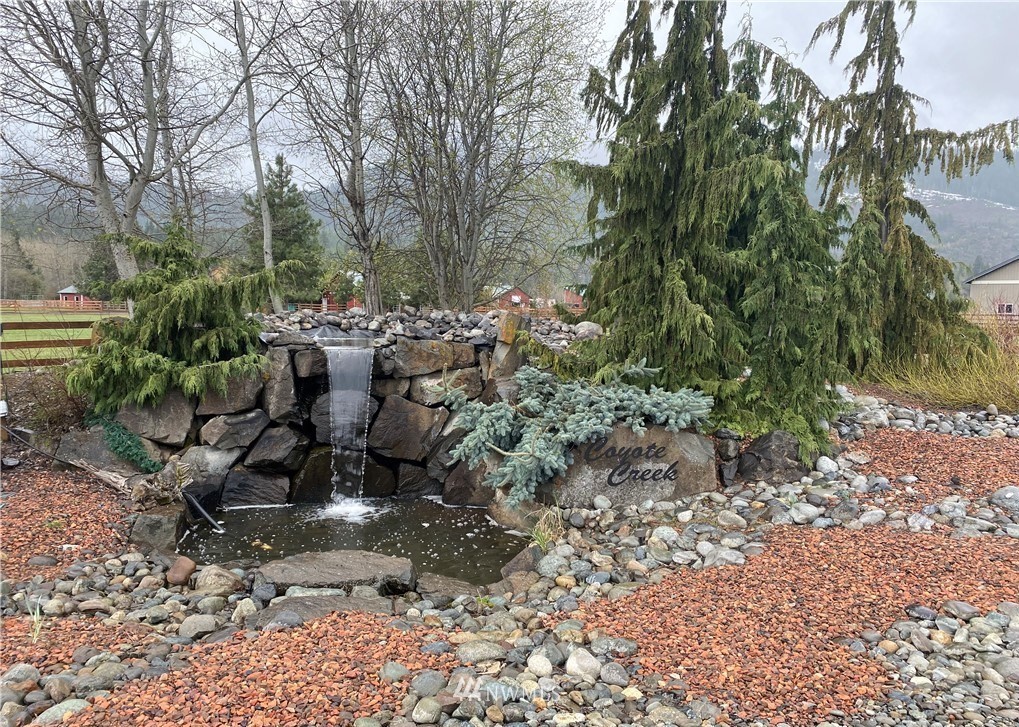 10 Old Cedars Road Cle Elum, WA 98922 - Photo 8 of 9 a view of a garden with sitting area