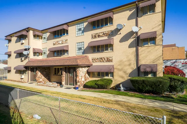 a view of a building with a street