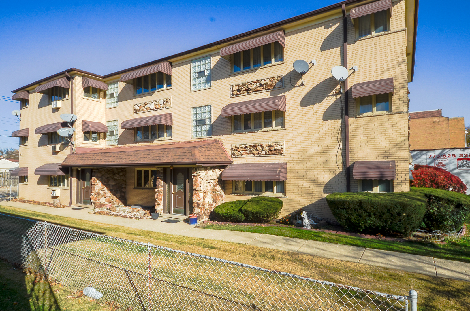 a view of a building with a street