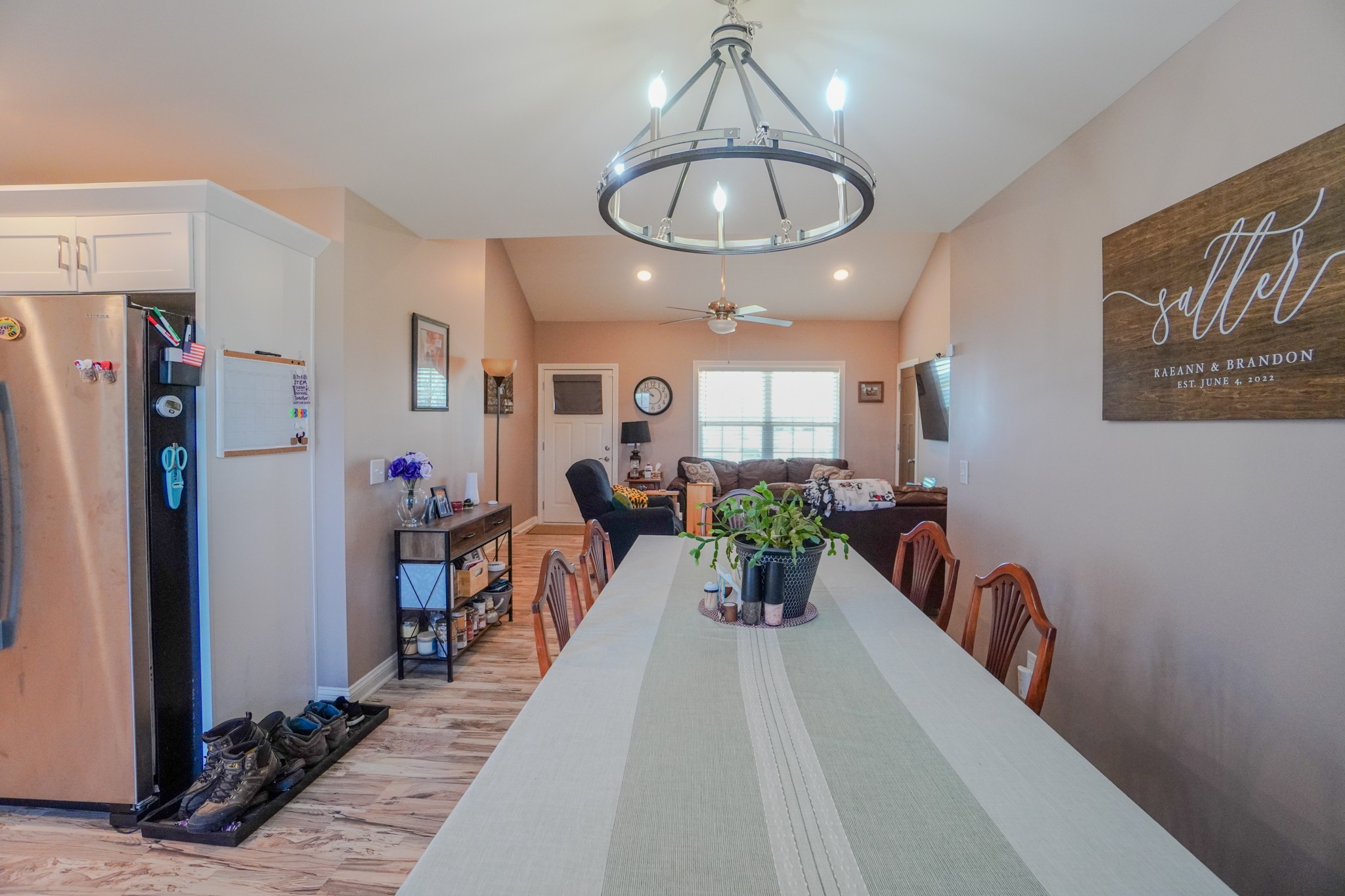 451 James Whitefield Road Bethpage, TN 37022 - Photo 14 of 52 a view of a dining room with furniture a chandelier and wooden floor