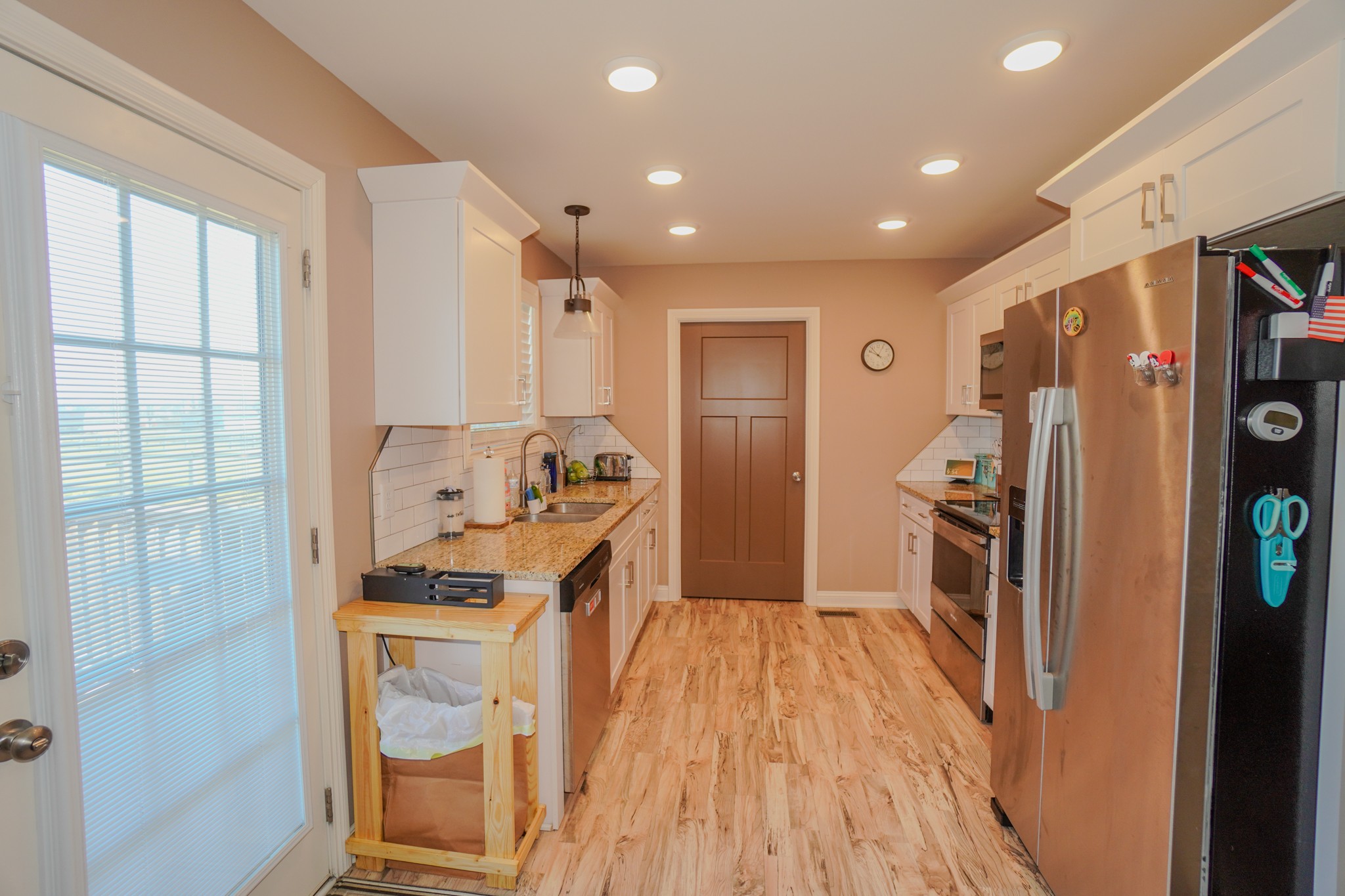 451 James Whitefield Road Bethpage, TN 37022 - Photo 20 of 52 a kitchen with stainless steel appliances a refrigerator and a stove top oven
