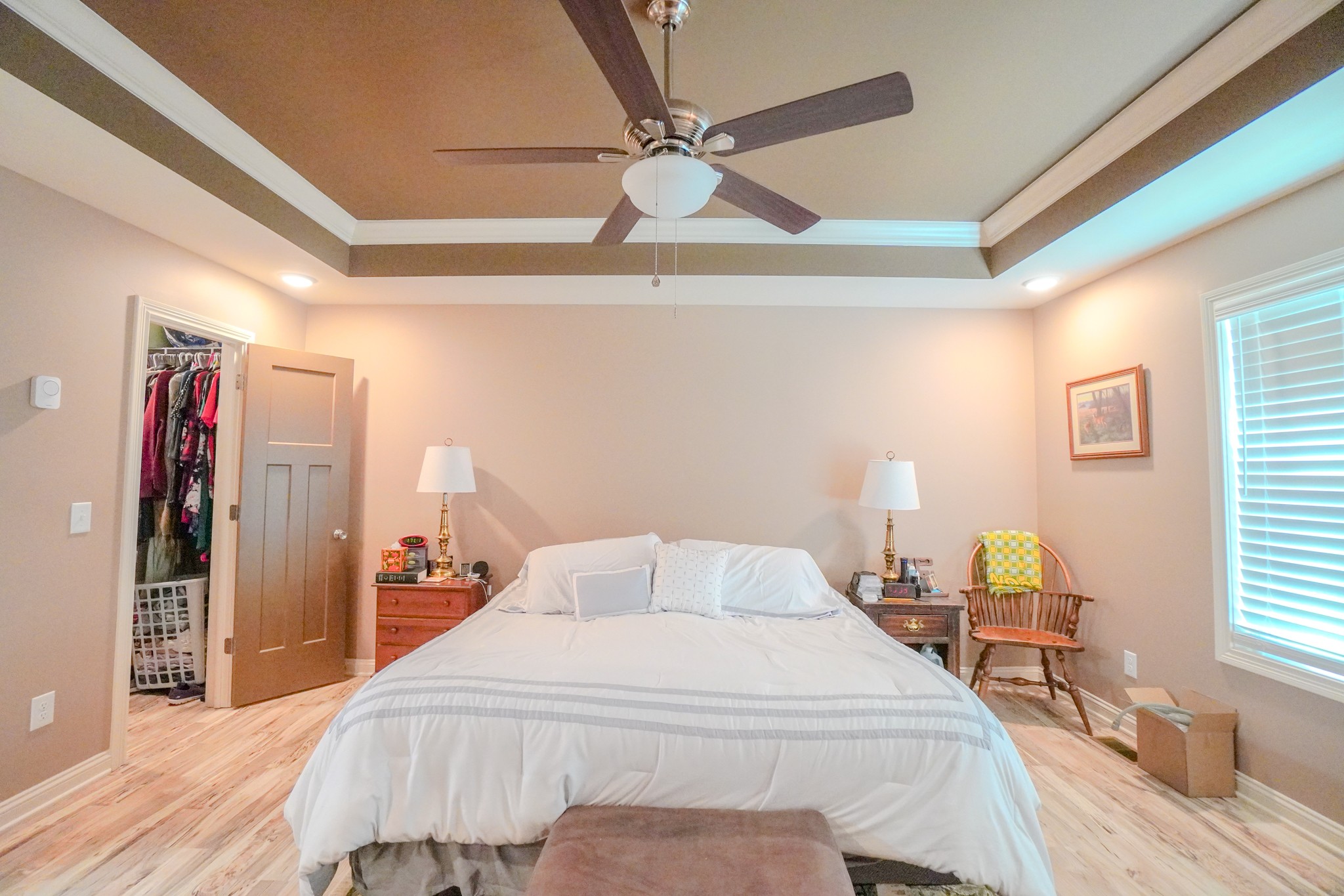 451 James Whitefield Road Bethpage, TN 37022 - Photo 28 of 52 a bedroom with a bed and a chandelier