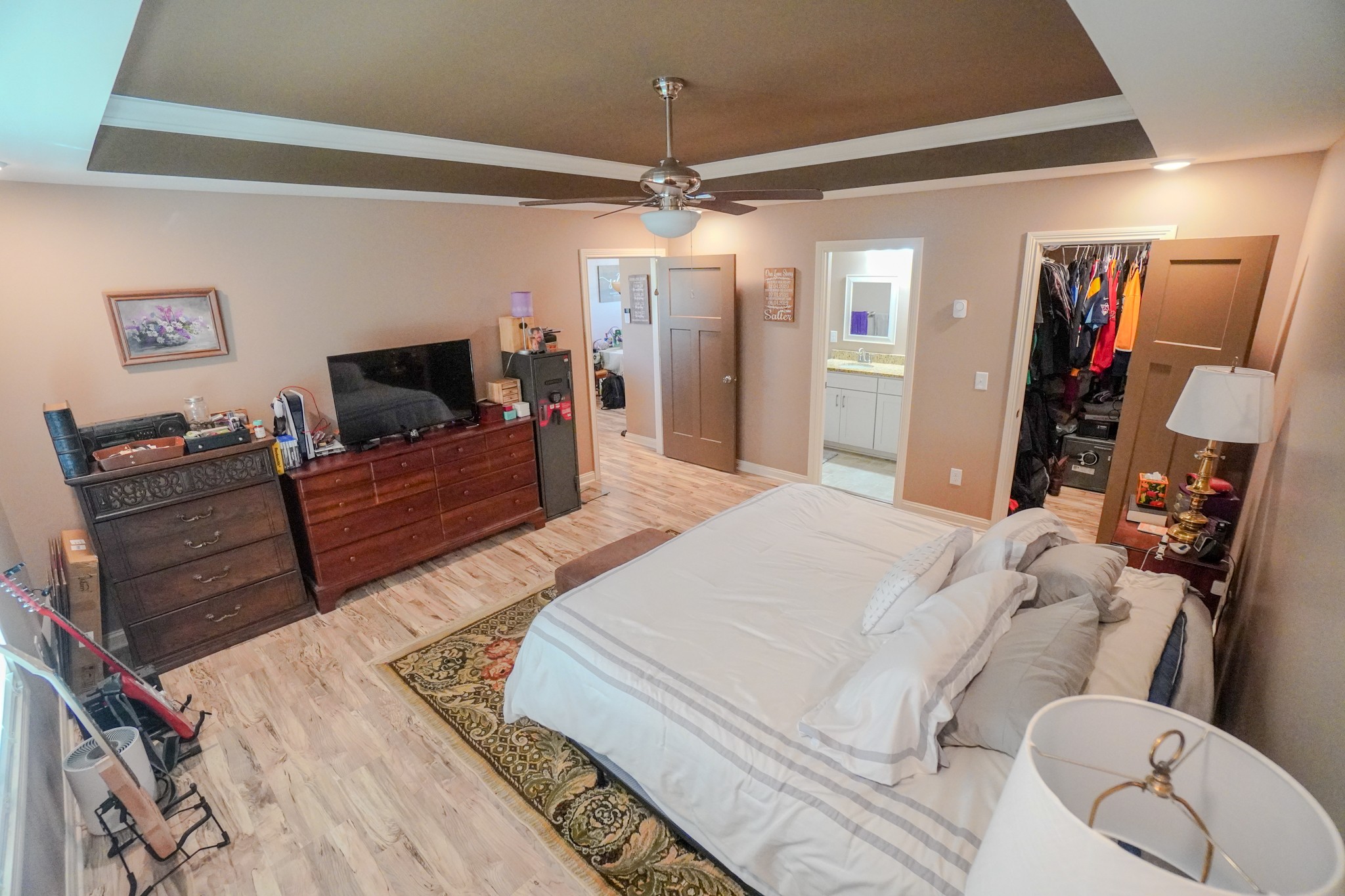 451 James Whitefield Road Bethpage, TN 37022 - Photo 30 of 52 a spacious bedroom with a bed and a flat screen television