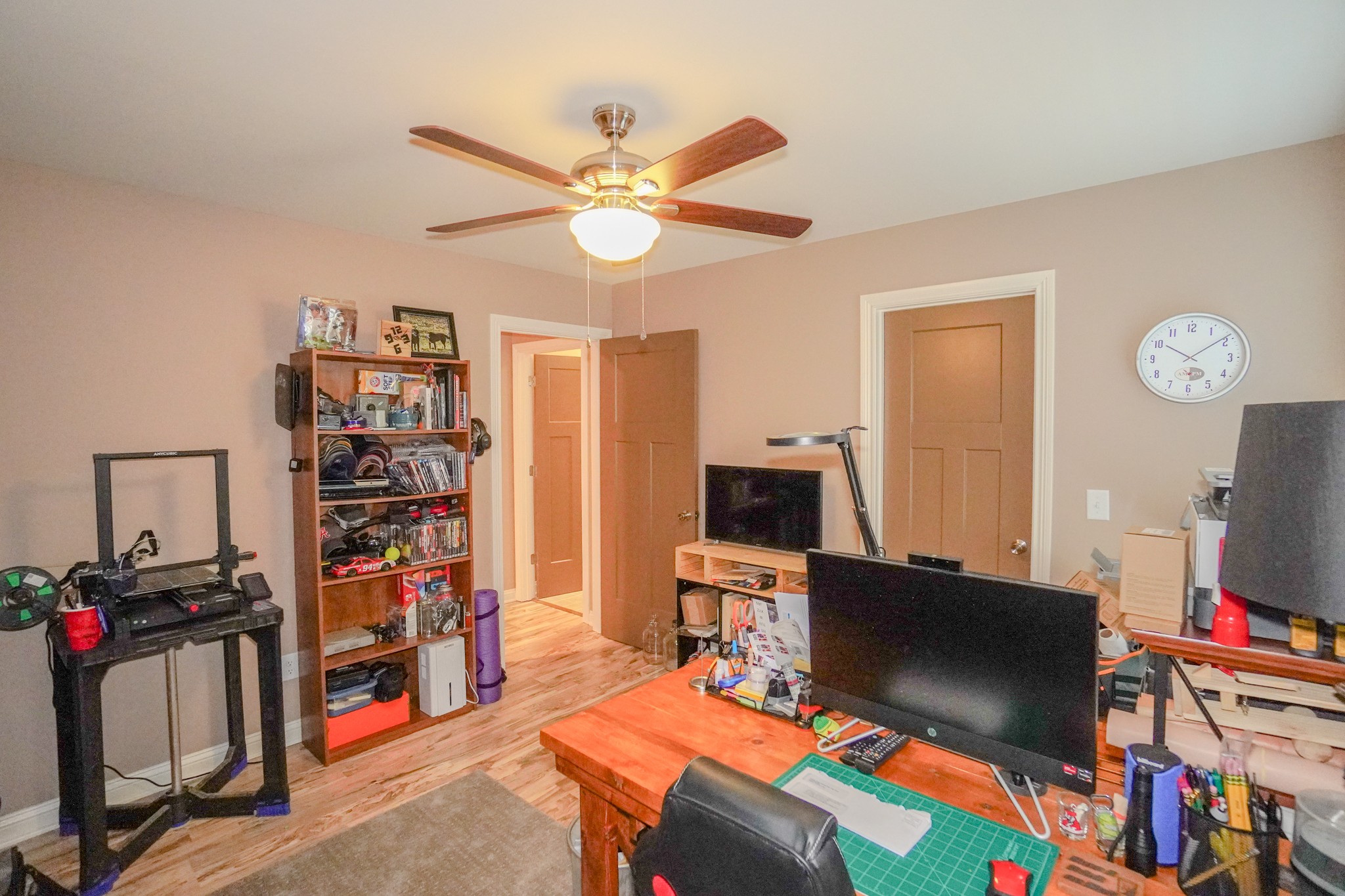 451 James Whitefield Road Bethpage, TN 37022 - Photo 37 of 52 a view of a workspace with furniture and a flat screen tv