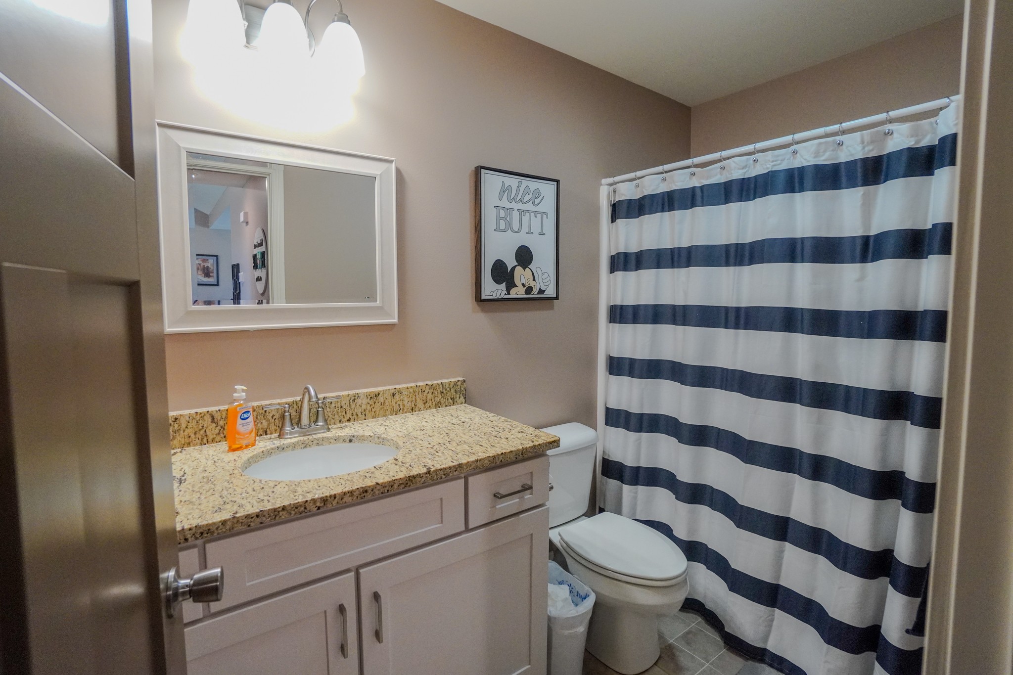 451 James Whitefield Road Bethpage, TN 37022 - Photo 44 of 52 a bathroom with a granite countertop sink and a toilet