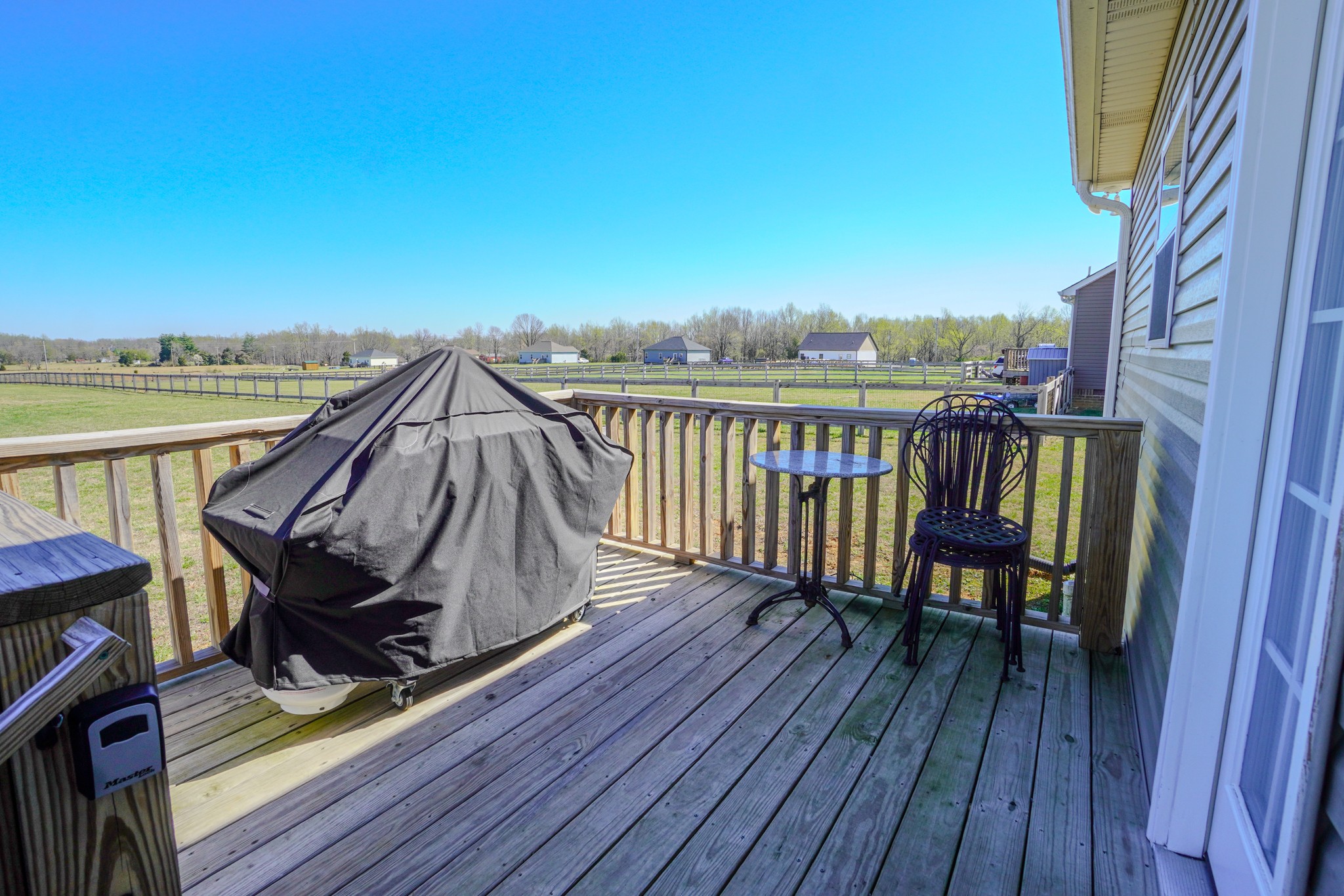 451 James Whitefield Road Bethpage, TN 37022 - Photo 47 of 52 a view of a balcony with wooden floor and outdoor seating