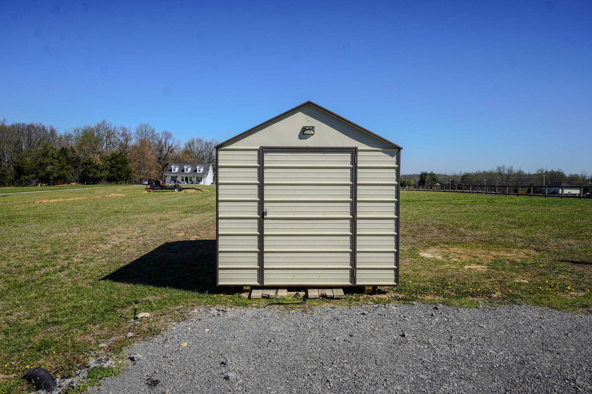 451 James Whitefield Road Bethpage, TN 37022 - Photo 52 of 52 a view of a dry yard with a house in the background