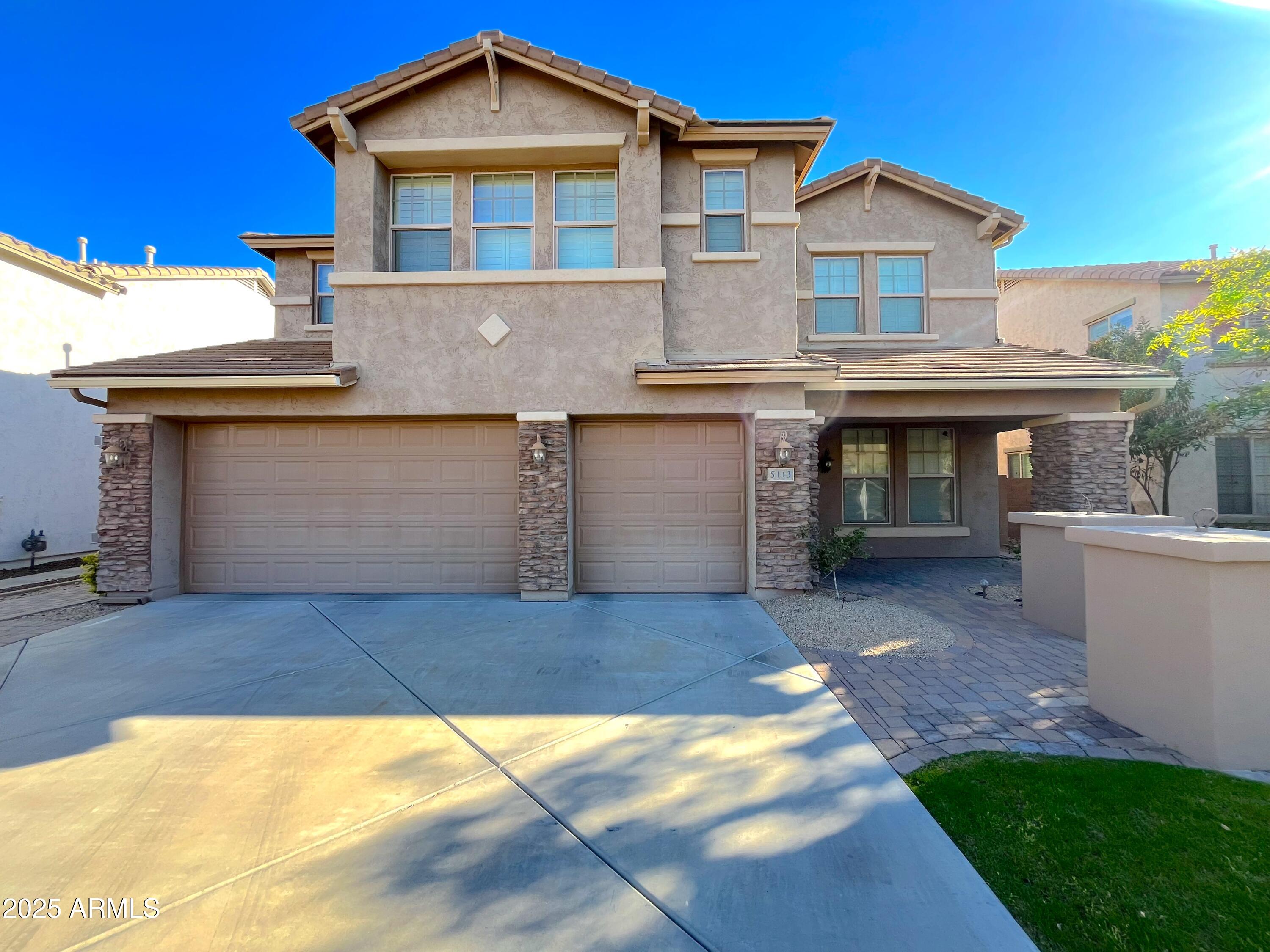 Restricted Address Phoenix, AZ 85083 - Photo 1 of 1 a front view of a house with a yard and garage