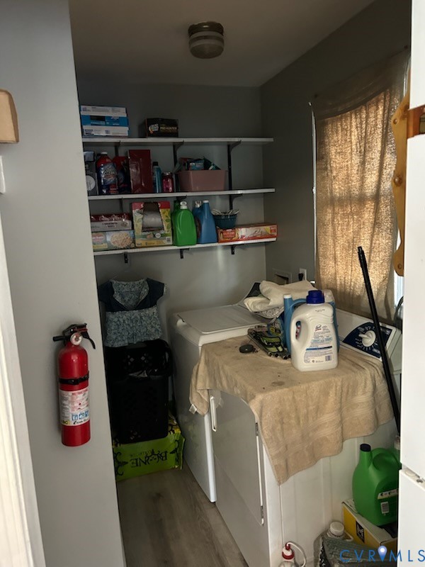 11707 Zilles Road Blackstone, VA 23824 - Photo 11 of 20 a storage room with washer and dryer