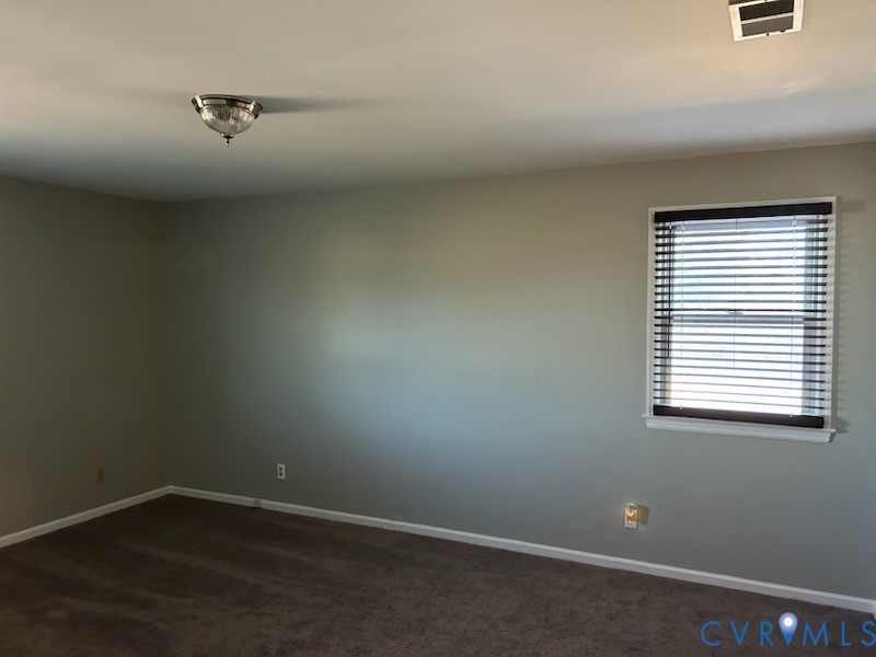 11707 Zilles Road Blackstone, VA 23824 - Photo 14 of 20 an empty room with a window