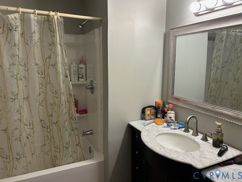 11707 Zilles Road Blackstone, VA 23824 - Photo 15 of 20 a bathroom with a sink and a mirror