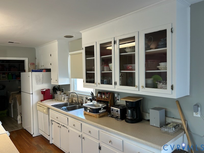 11707 Zilles Road Blackstone, VA 23824 - Photo 4 of 20 a kitchen with a refrigerator and a sink