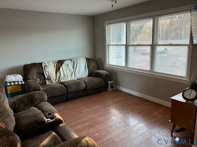 11707 Zilles Road Blackstone, VA 23824 - Photo 10 of 20 a living room with furniture and a window