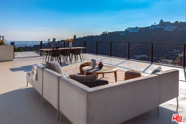 a terrace view with sitting space