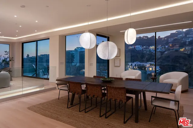a view of a table and chairs in a room