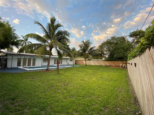 a view of a house with a swimming pool