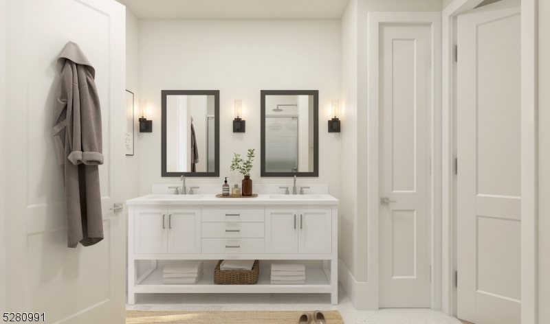 a bathroom with double vanity sink and mirror