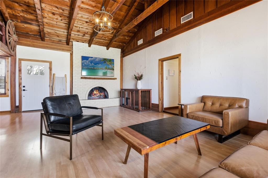 9213 Wilson Road Pilot Point, TX 76258 - Photo 6 of 36 Vaulted wood-beam ceiling with exposed wood planks