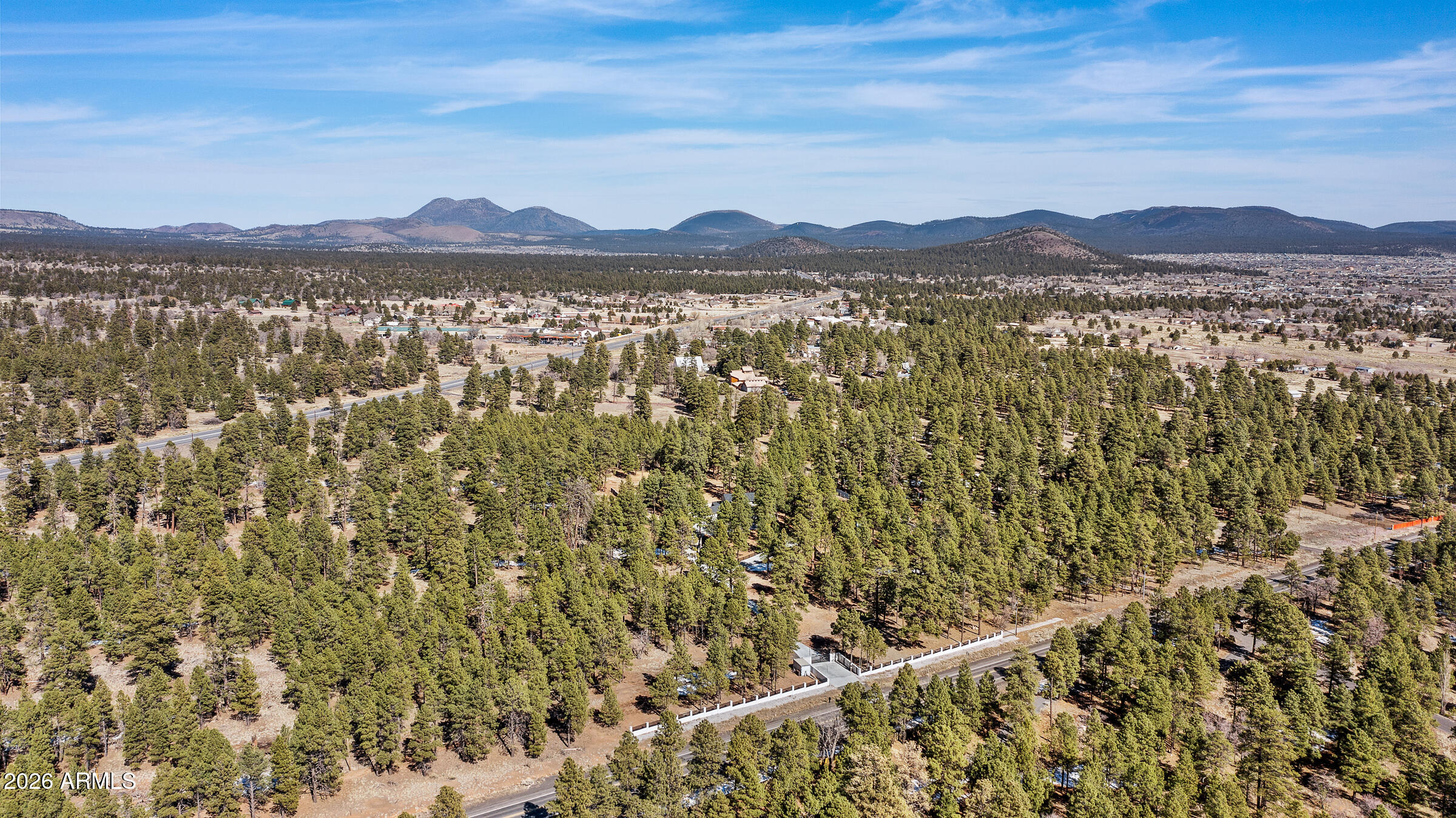5055 Townsend-Winona Road, Unit 3 Flagstaff, AZ 86004 - Photo 7 of 11 a view of a city with mountain