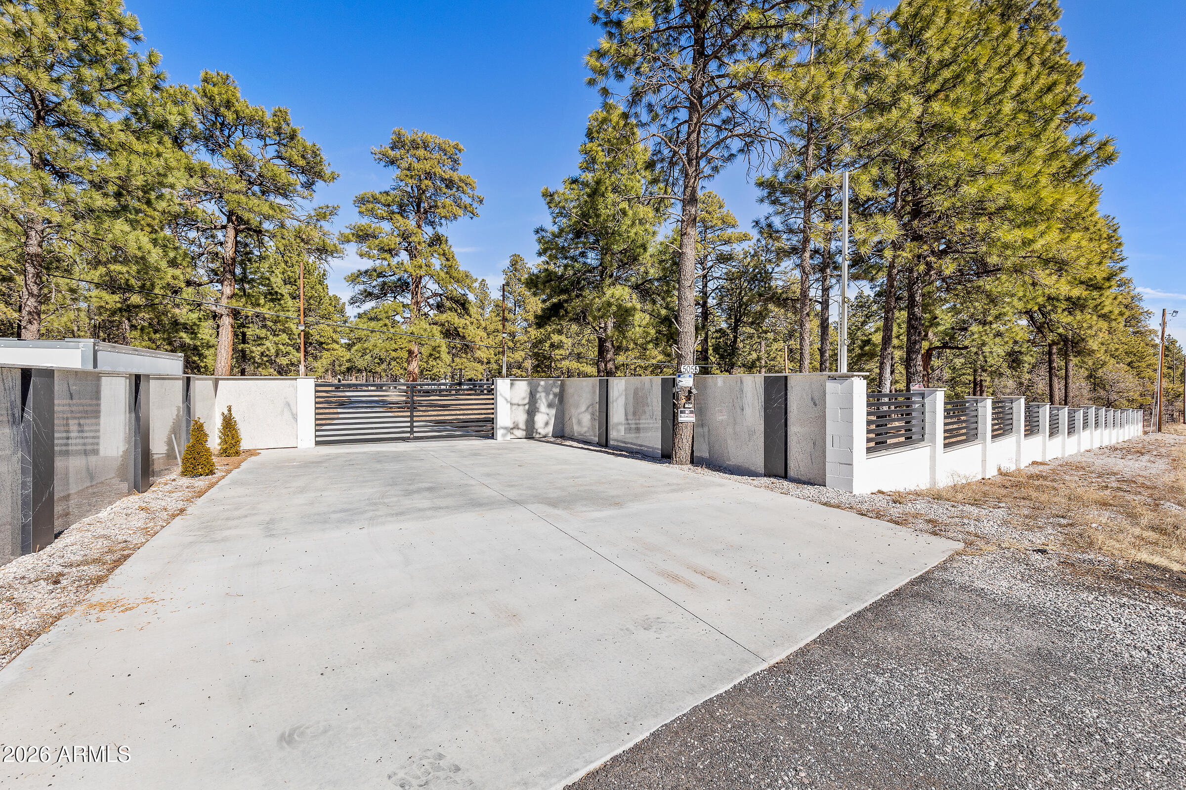 5055 Townsend-Winona Road, Unit 3 Flagstaff, AZ 86004 - Photo 8 of 11 a view of street with large trees