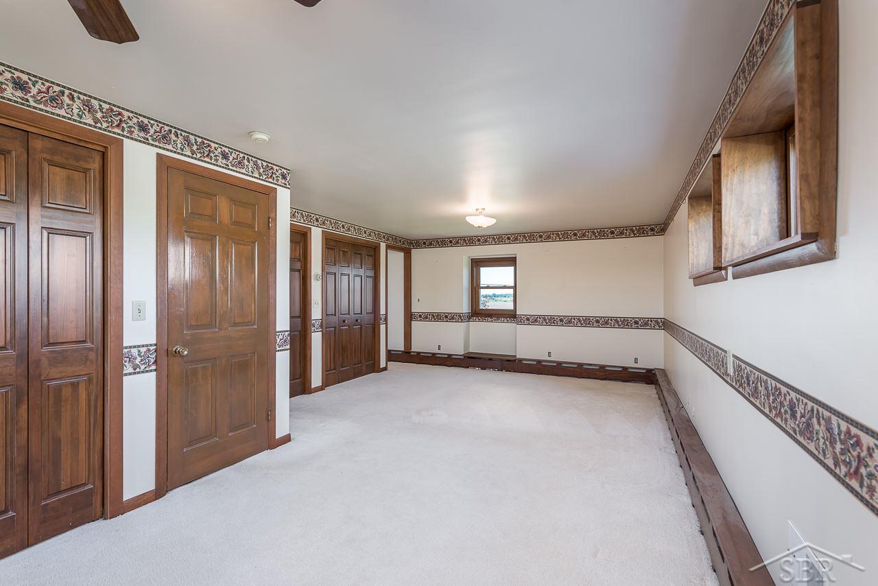 9045 Pierce Road Freeland, MI 48623 - Photo 18 of 30 This generous 2nd floor bedroom has 3 closets