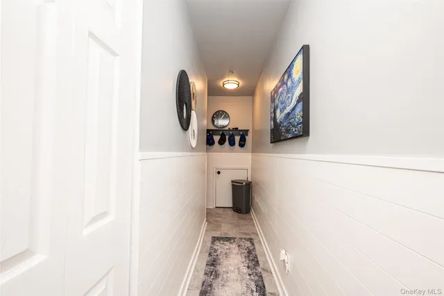 a view of a hallway with entryway