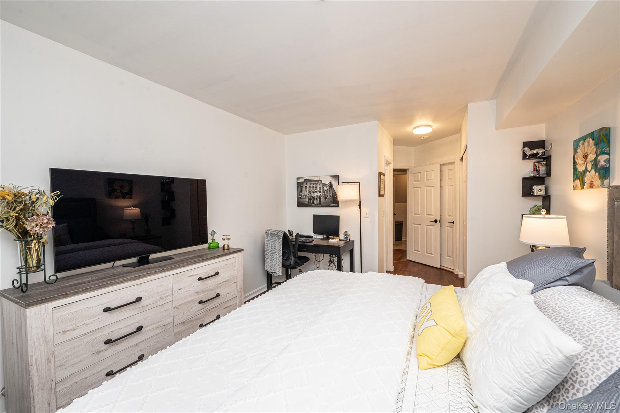 1 Casey Lane Middle Island, NY 11953 - Photo 15 of 35 a bedroom with a bed and a flat screen tv