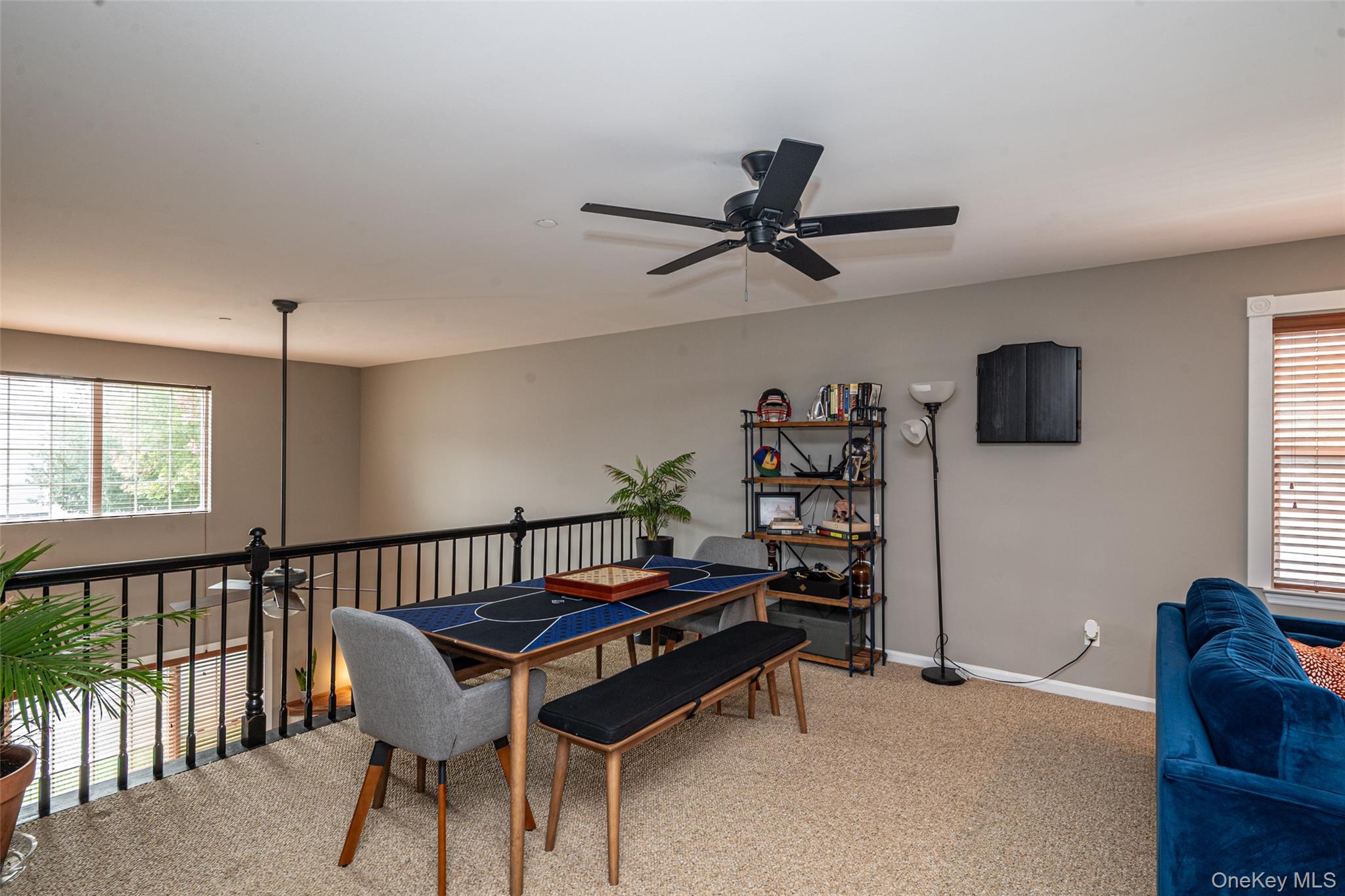 1 Casey Lane Middle Island, NY 11953 - Photo 22 of 35 a living room with furniture a window and a flat screen tv