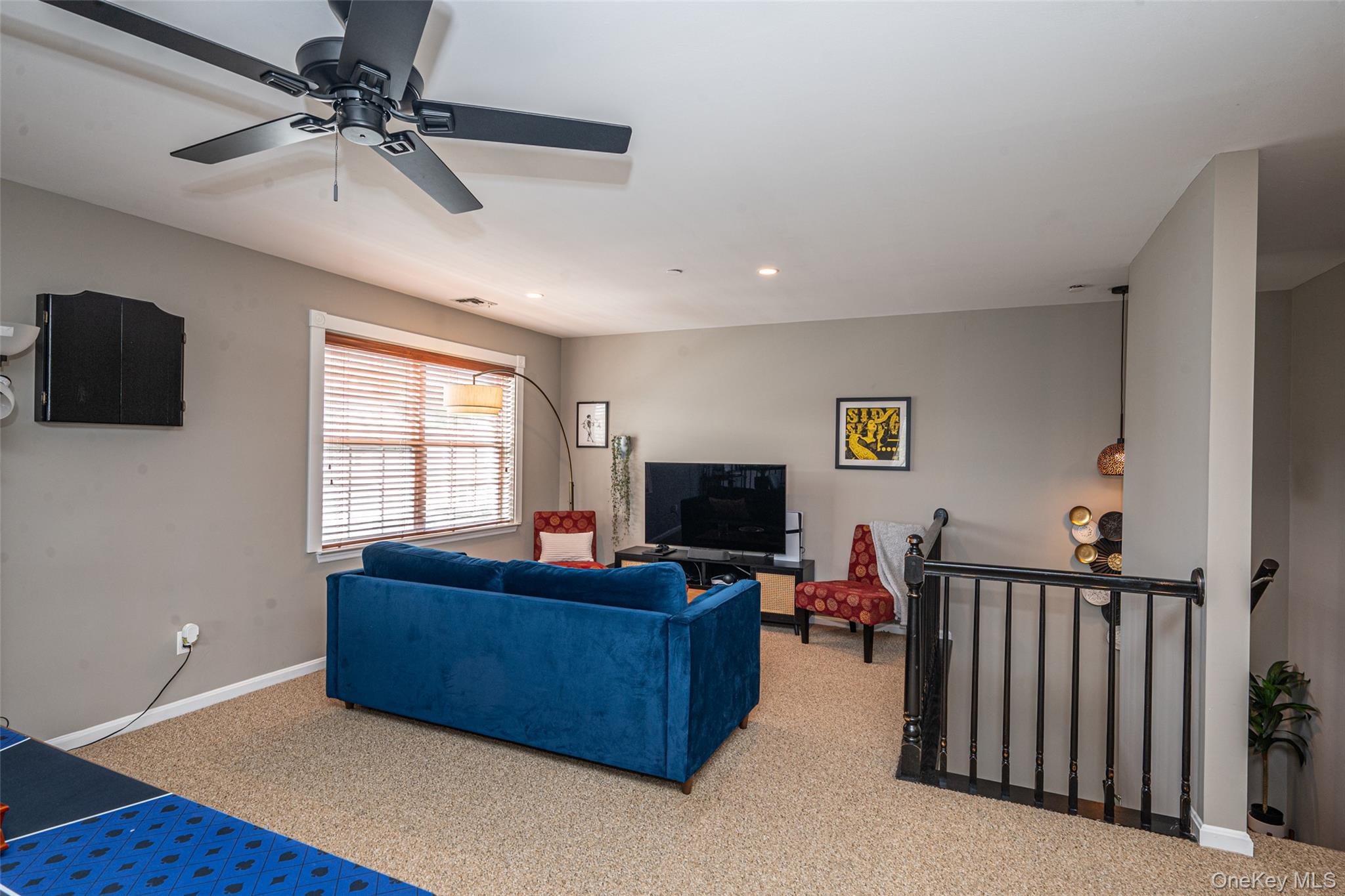 1 Casey Lane Middle Island, NY 11953 - Photo 24 of 35 a living room with furniture and a flat screen tv