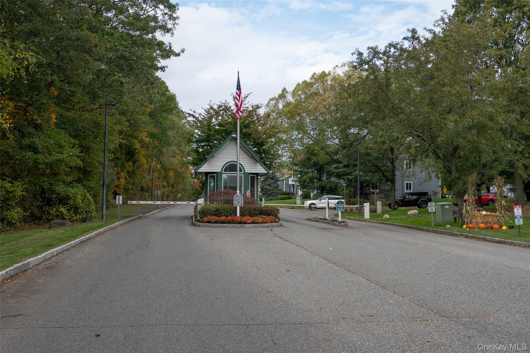 1 Casey Lane Middle Island, NY 11953 - Photo 30 of 35 a view of a street with a bench and trees