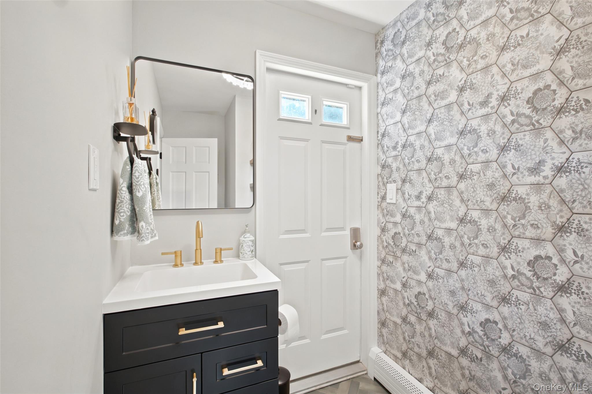 17 Lower Road Smithtown, NY 11787 - Photo 11 of 29 half bath off kitchen with outside entrance