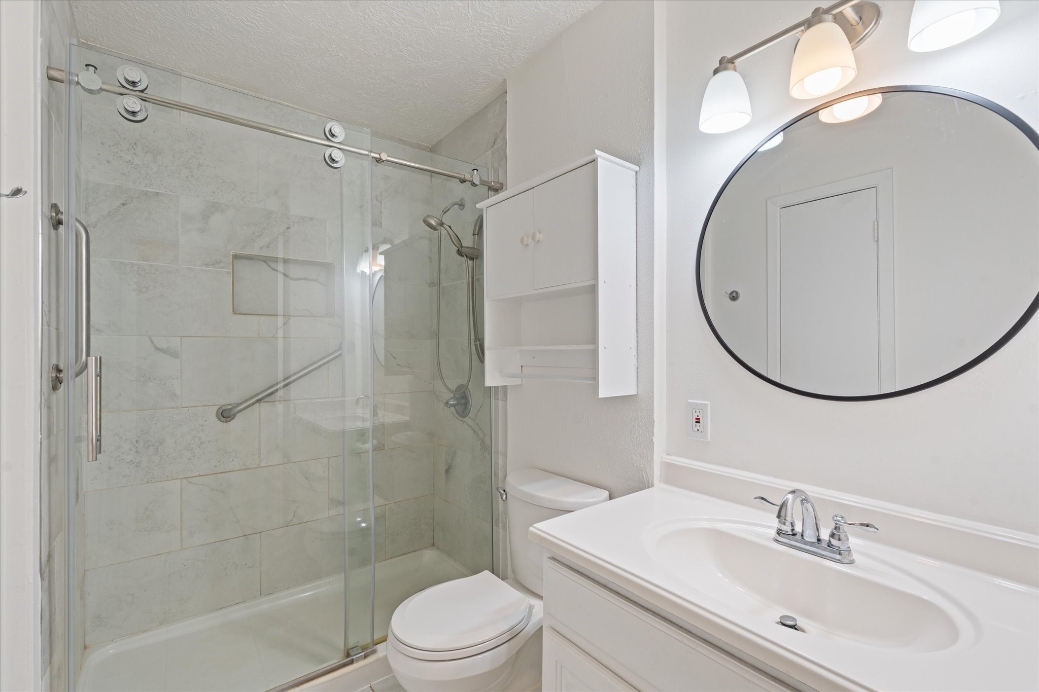 110 Dozent Lane Baytown, TX 77521 - Photo 22 of 36 Chic secondary bathroom featuring a sleek walk-in shower.