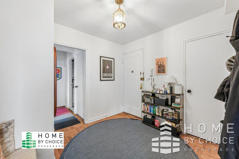 100 Remsen Street, Unit 8A Brooklyn, NY 11201 - Photo 11 of 14 a bedroom with furniture and a window