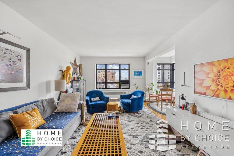 100 Remsen Street, Unit 8A Brooklyn, NY 11201 - Photo 2 of 14 a living room with furniture a rug and a flat screen tv