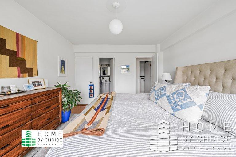 100 Remsen Street, Unit 8A Brooklyn, NY 11201 - Photo 8 of 14 a bedroom with furniture and a wooden floor