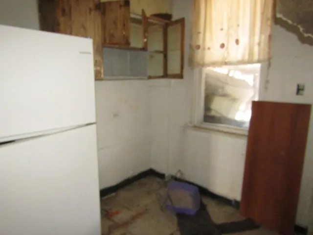 a view of a bedroom with a window