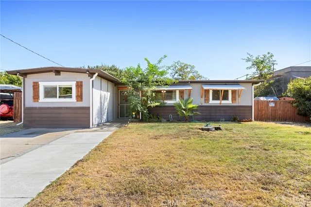 front view of house with a yard