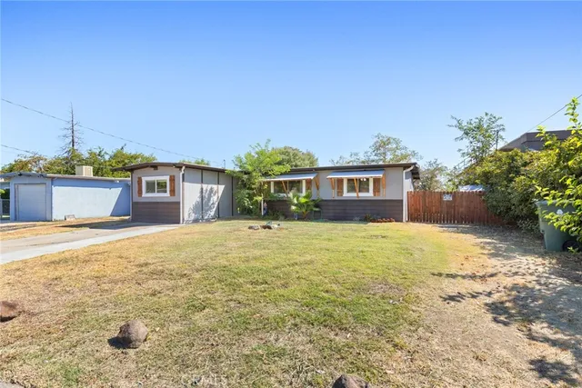 a house view with a garden space