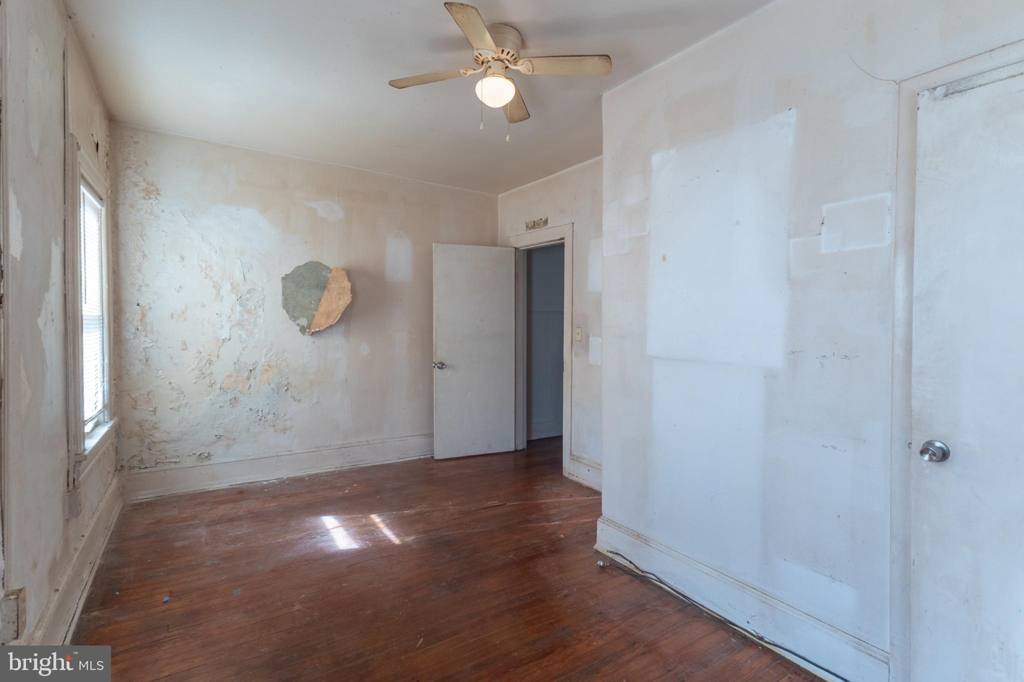 5911 Crown Street Capitol Heights, MD 20743 - Photo 11 of 28 a view of a livingroom with wooden floor