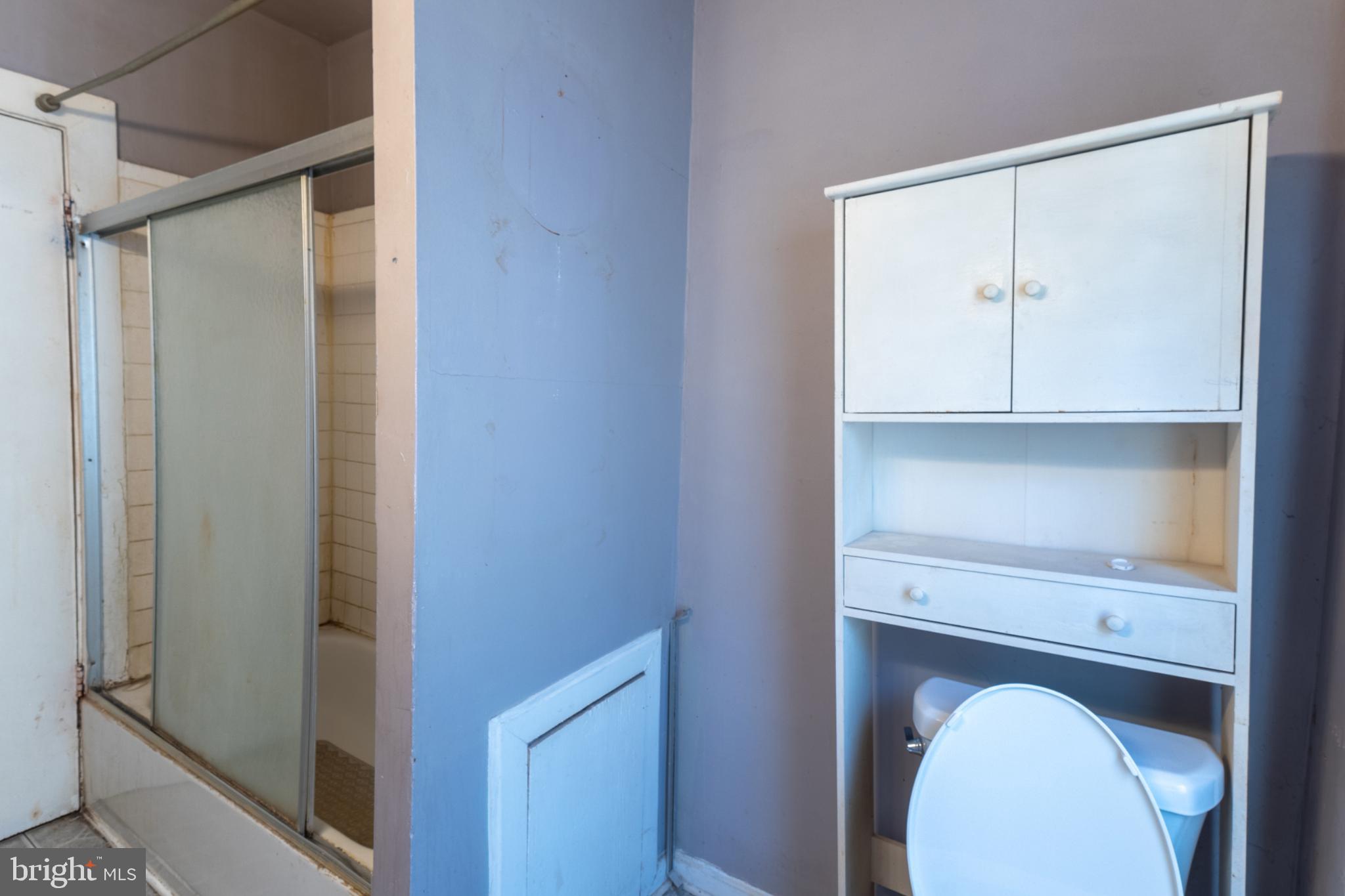 5911 Crown Street Capitol Heights, MD 20743 - Photo 15 of 28 a close view of cabinet and mirror
