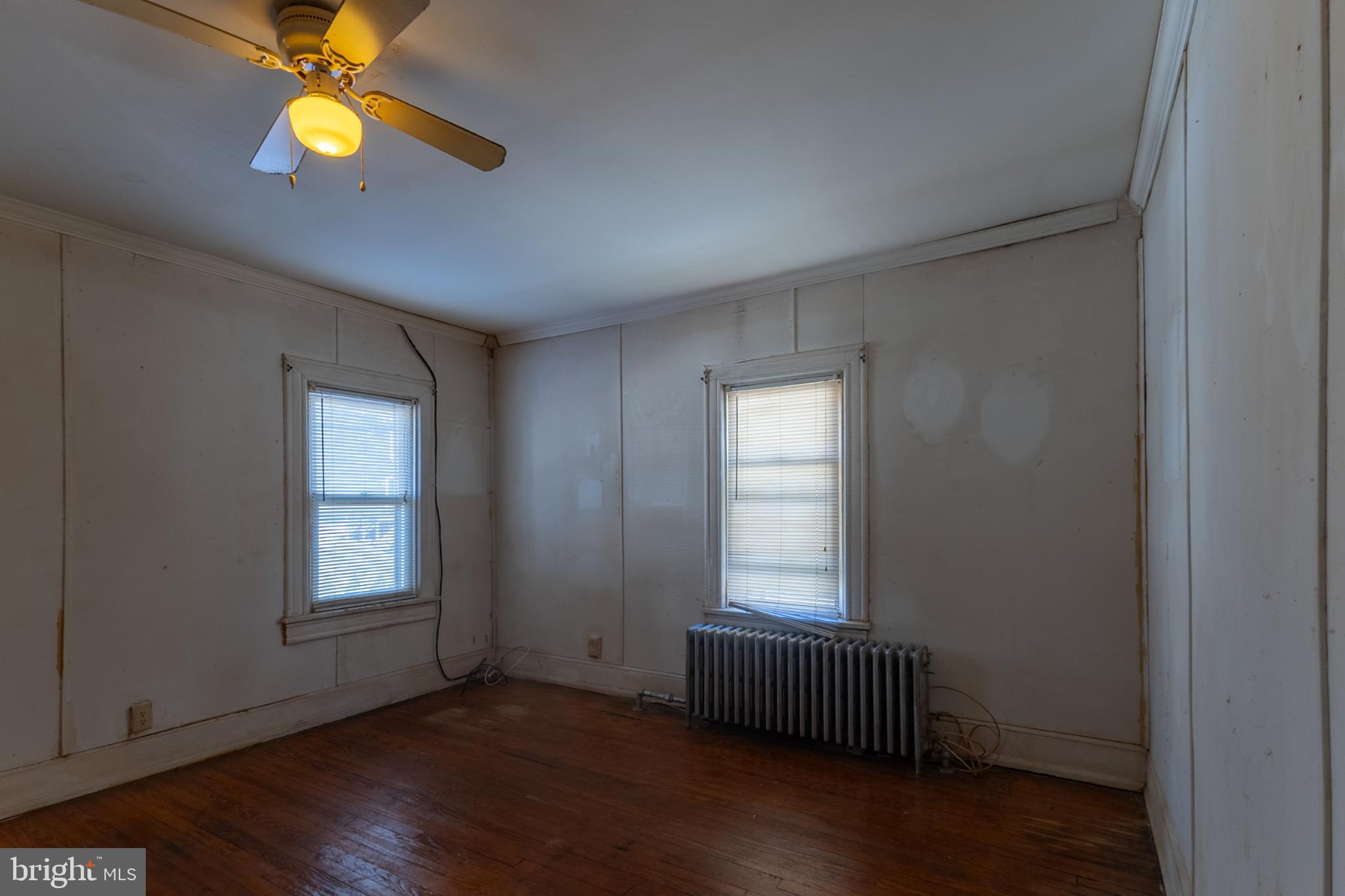 5911 Crown Street Capitol Heights, MD 20743 - Photo 16 of 28 an empty room with windows and closet