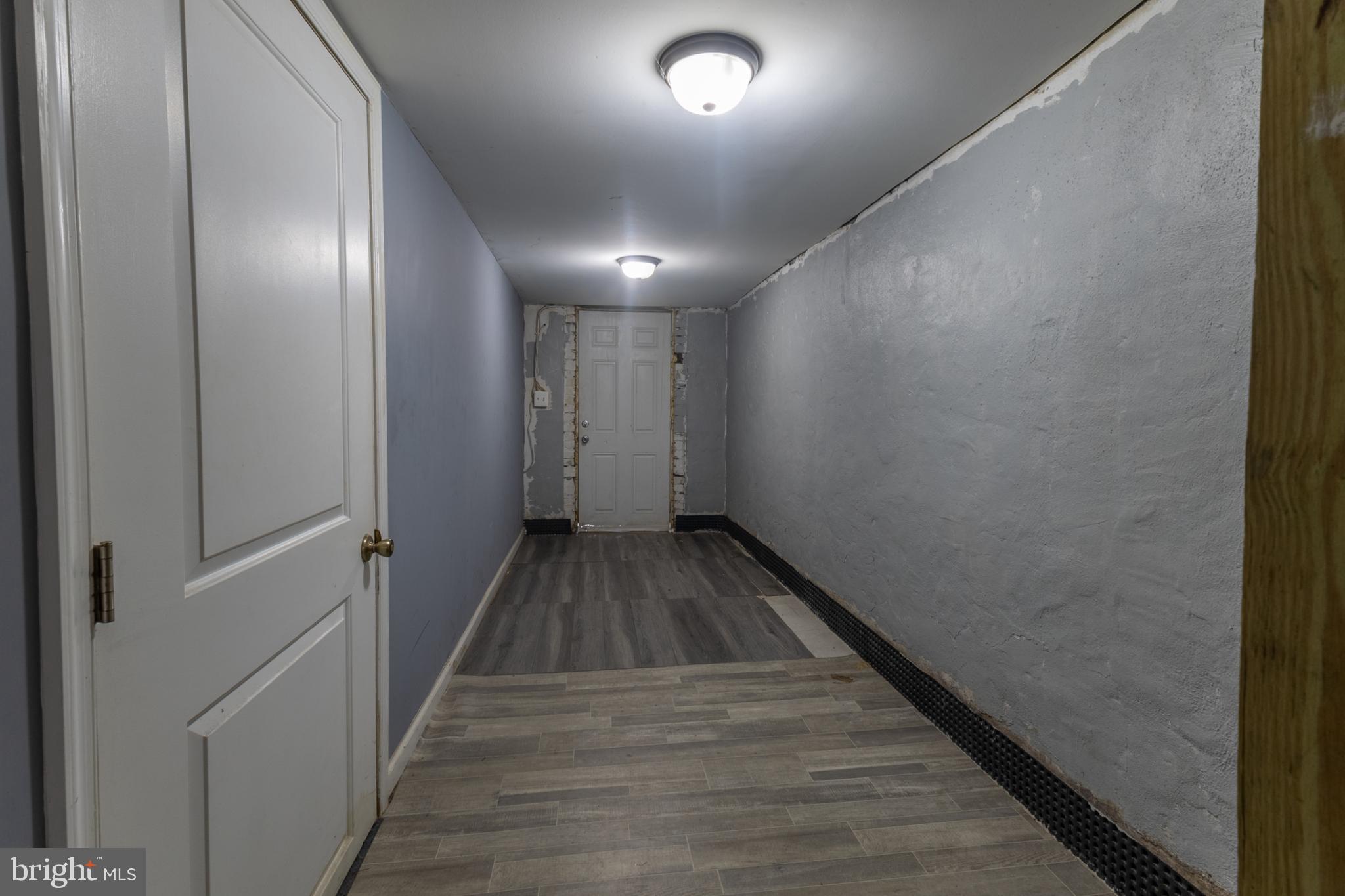 5911 Crown Street Capitol Heights, MD 20743 - Photo 20 of 28 a view of hallway with wooden floor