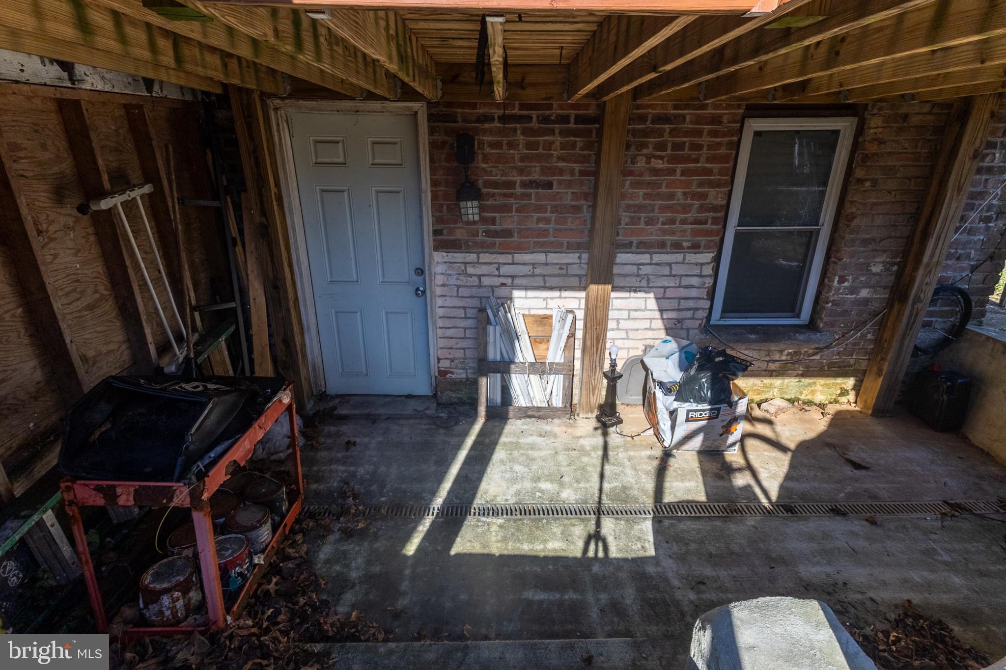 5911 Crown Street Capitol Heights, MD 20743 - Photo 27 of 28 a backyard of a house with table and chairs