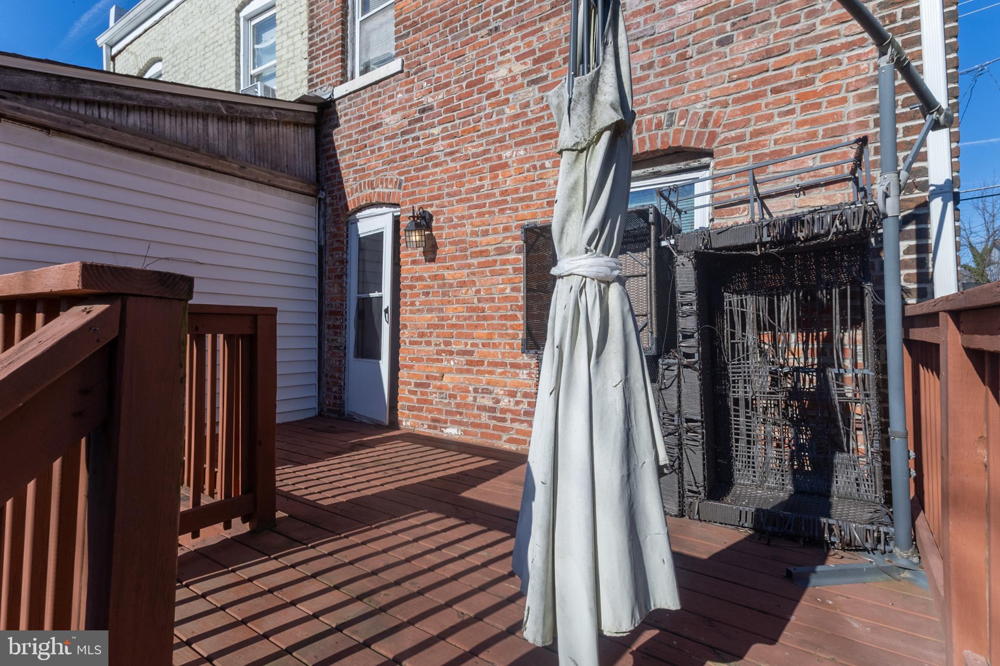 5911 Crown Street Capitol Heights, MD 20743 - Photo 28 of 28 a view of a house with a door and wooden floor